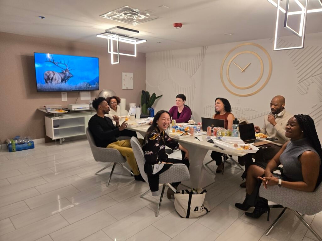 Group meeting in the conference room at Wanderstay Boutique Hotel with seating for up to 10 guests